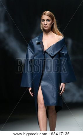 ZAGREB, CROATIA - APRIL 10 : Fashion model wears clothes made by Petra Vuletic and Sasa Hortig on 