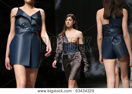 ZAGREB, CROATIA - APRIL 10 : Fashion model wears clothes made by Petra Vuletic and Sasa Hortig on 