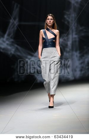 ZAGREB, CROATIA - APRIL 10 : Fashion model wears clothes made by Petra Vuletic and Sasa Hortig on 