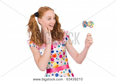 Redhead young girl with lolipops isolated on white