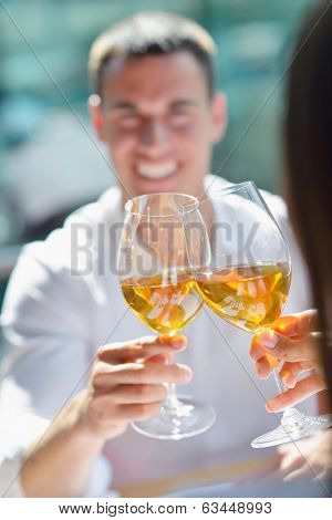 happy young couple having lanch at beautiful restaurant on by the sea on  beach