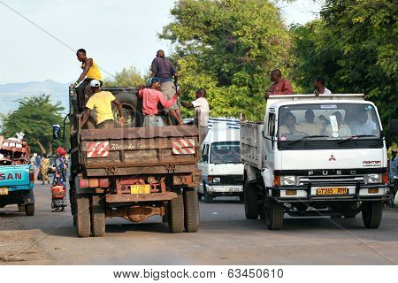 African Men Make Trip Back Of A Truck.