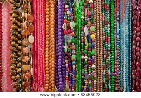 Strings Of Colorful Beads And Gem Stones