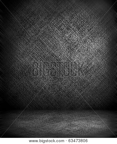 Abstract stonework background texture with old weathered dark stucco black paint stone cement wall in rural room Grungy cold rock surface in hard grime empty place with niello granite dull light floor