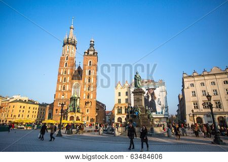 KRAKOW, POLAND - FEB 26, 2014: View of the Main Square. It dates to the 13th century, and at roughly 40,000 m it is the largest medieval town square in Europe.