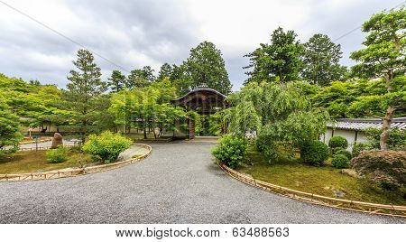 Ornamental Wooden Gate And Temple Courtyard In Arashiyama District, Kyoto, Japan