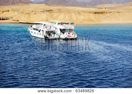 Sharm El Sheikh, Egypt -  December 4: Snorkeling Tourists And Motor Yachts On Red Sea In Ras Muhamma
