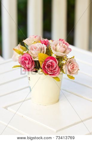 Artificial Flower In Metal Vase.