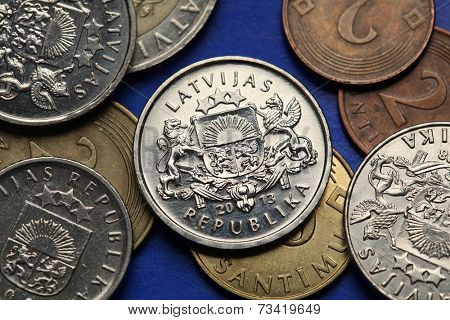 Coins of Latvia. Latvian national large coats of arms depicted in old Latvian lats coins. 