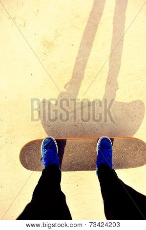 skateboarding legs at skatepark