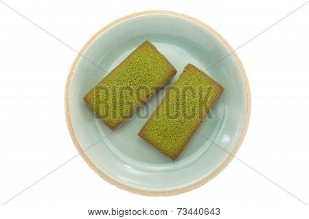 Japanese Maccha green tea financier cake on white