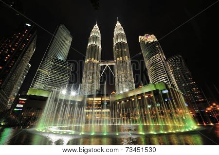 KUALA LUMPUR, MALAYSIA - AUGUST 31: Petronas Twin Towers at night on August 31, 2012 in Kuala Lumpur. Petronas Twin Towers  were the tallest buildings (452 m) in the world from 1998 to 2004.