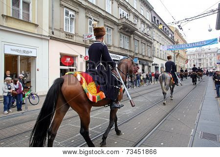 ZAGREB, CROATIA - OCTOBER 04: The parade of 70 participants, thirty horses and forty members of a brass band to the main square were announced next, 300th Sinjska Alka, on October 04, 2014 in Zagreb.