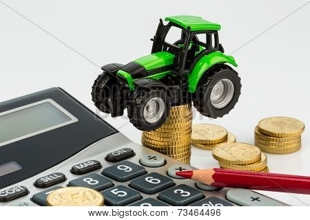 farmers in agriculture have to reckon with rising costs. higher prices for food, fertilizer and plants. tractor with coins and calculator