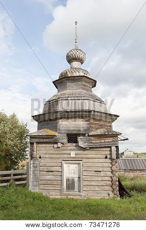 Ancient Wooden Chapel In Russian Village