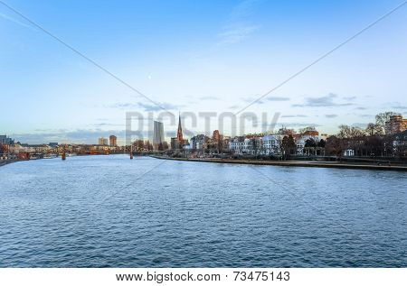 FRANKFURT, HESSE - February 12 : River view of The Eiserner Steg.The Eiserner Steg is a pedestrian bridge in Frankfurt am Main built in 1868. City skyline on February 12, 2014 in Frankfurt, Germany.