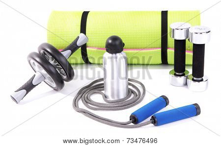 Sports requisites on sport mat isolated on white