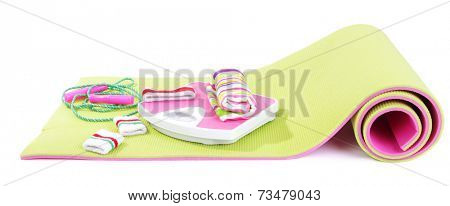 Sport requisites on a carpet isolated on white