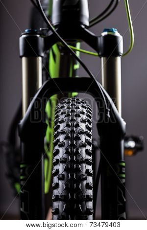 close-up of a mountain bike spring fork, studio shot.