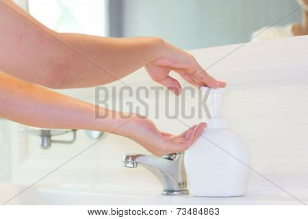 Hands Applying Sanitizer Soap