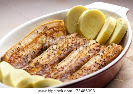 baked pork belly on cumin with potato dumlings