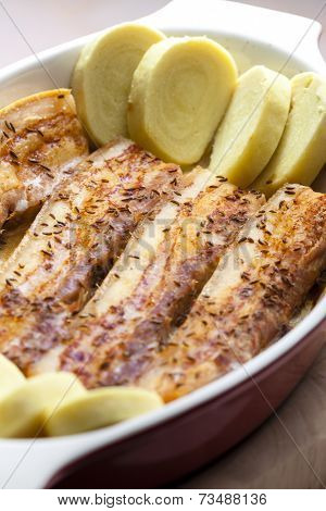 baked pork belly on cumin with potato dumlings