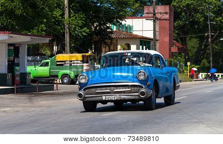 HAVANA,CUBA - June 27, 2014: Blue classic car on the road in havana
