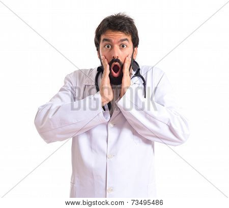 Doctor Doing Surprise Gesture Over White Background