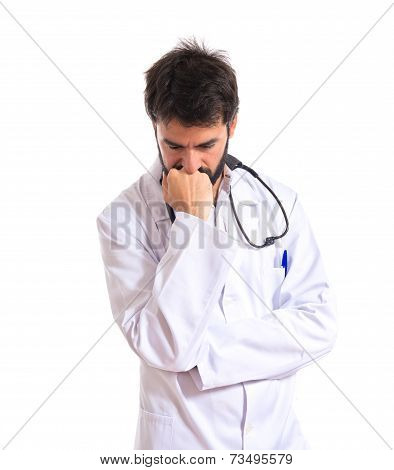 Doctor Thinking Over Isolated White Background