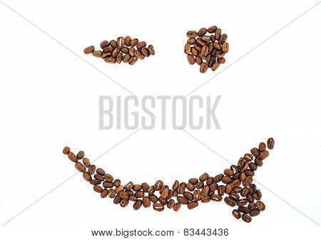 Grains of coffee in the form of smiling face isolated. coffee beans isolated on white background. ro