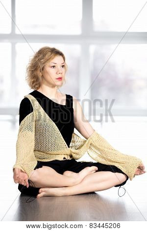 Serene Yogi Female Resting In Cross-legged Yoga Pose