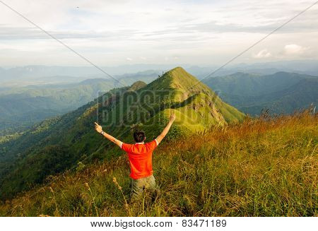 Men Survey At The Top Of  (khao Chang Puak) Mountains In Thailand
