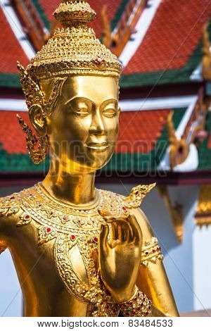 Golden Kinnari Statue At Temple Of Emerald Buddha (wat Phra Kaew) In Grand Royal Palace. Bangkok, Th