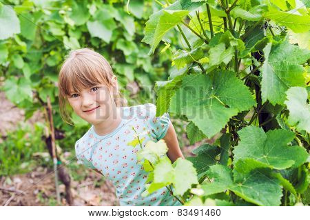 Summer portrait of a cute little girl