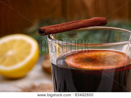 Mulled wine, punch and spices for glintwine on wooden background