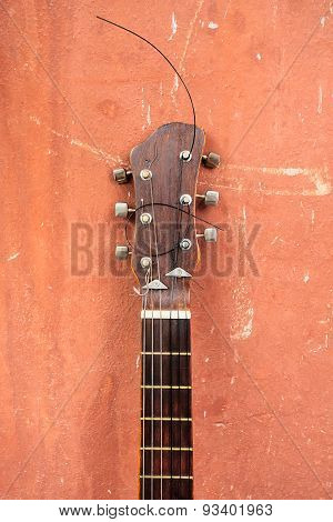 guitar on a brown background