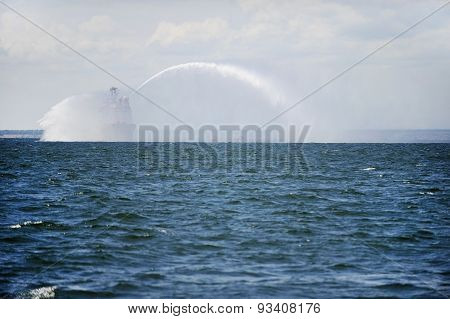Fireboat In Action On The Sea