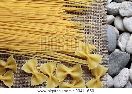 Spaghetti Farfalle On Burlap Fray