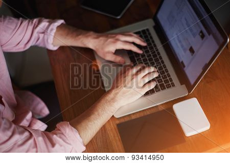 Top view shot freelancer man working with digital computer on beautiful website