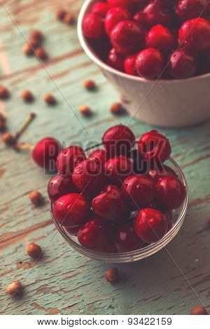 Sweet Cherries In Bowl On Rustic Table