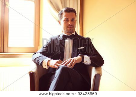Elegant Young Fashion Man In A Hotel Room