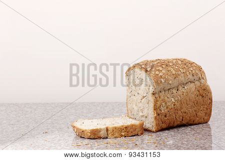 Whole Wheat Bread Sliced On Marble Table