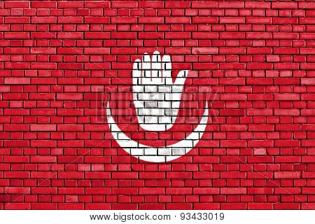 Former Flag Of Anjouan Painted On Brick Wall
