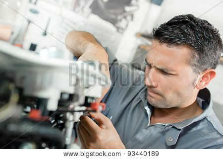 Man using machinery