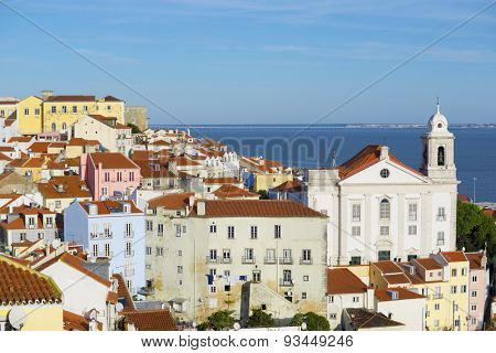 Alfama downtown and Santo Estevao Church in Lisbon, Portugal.