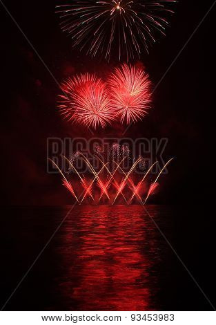 Colorful Fireworks With Reflection On Lake.