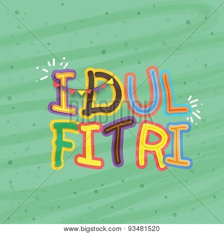 Colorful creative text Idulfitri on stylish green background for muslim community festival, Eid Mubarak celebration.