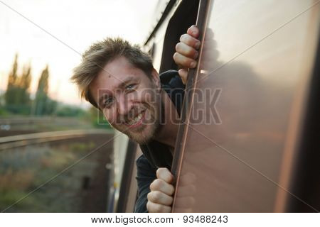 Enjoying ther ailroad journey in the window