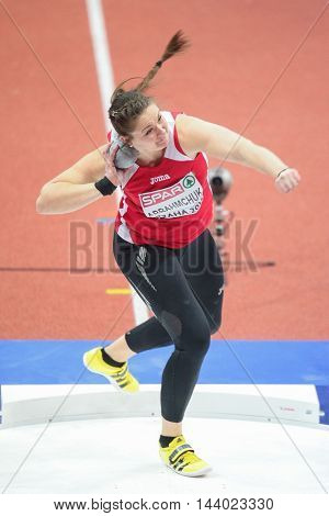PRAGUE, CZECH REPUBLIC - MARCH 5, 2015: Alena Abrahmchuk (#511 Belarus) competes in the women's shot put event of the European Athletics Indoor Championship.