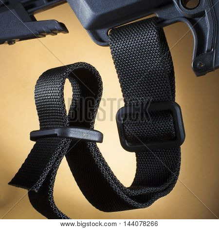 One inch nylon sling attached to the butt stock of an AR-15
